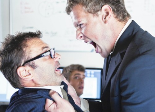 Man holding and shouting at co-worker. (Dimitri Vervitsiotis/The Image Bank) ** TCN OUT **