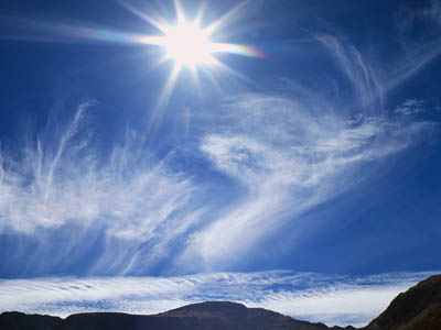 Sun and Wispy Clouds Over Mountains ca. 2001 Toyama, Japan
